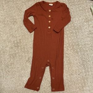 Kate Quinn one piece outfit